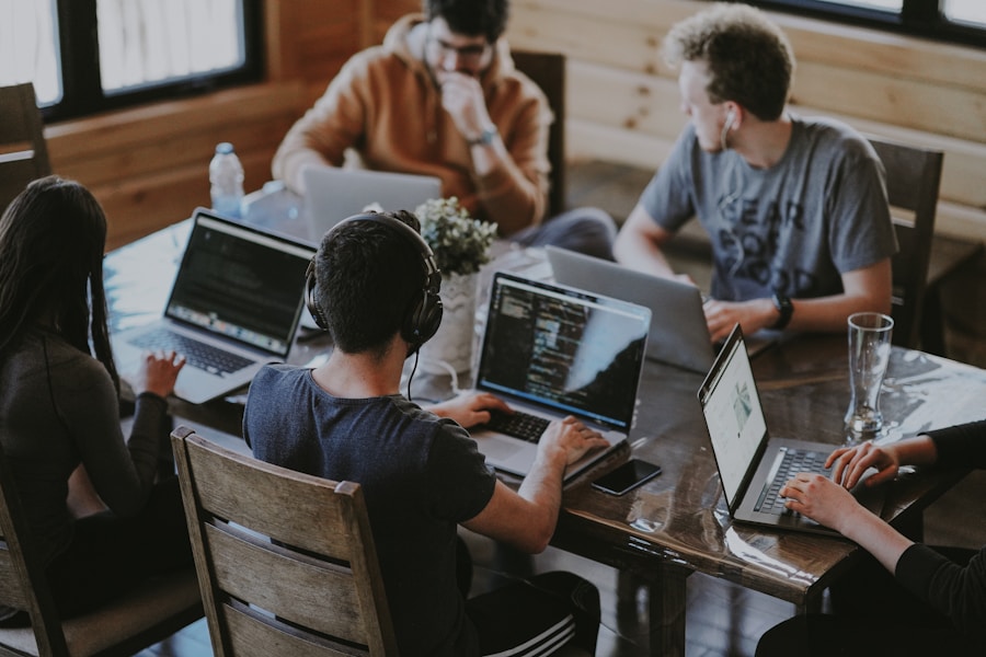 Small team working together on laptops
